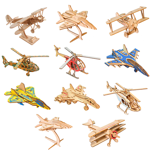 Collection of wooden model airplanes and helicopters on a white background
